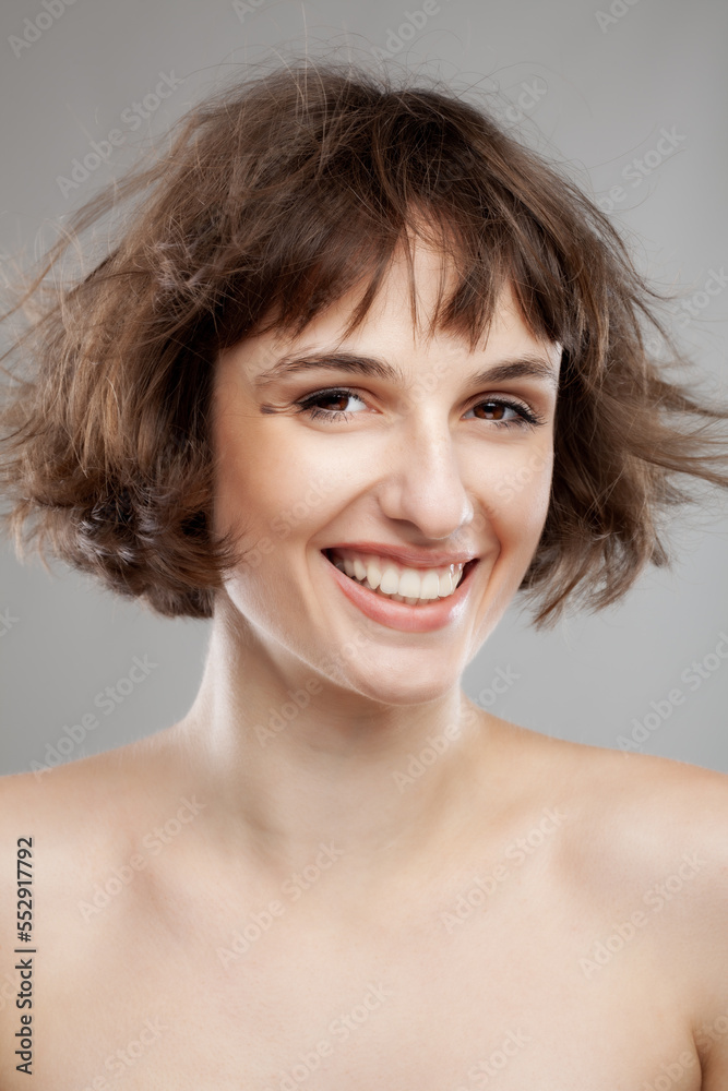 beauty portrait of a brunette girl with short hair in the air beauty portrait of a brunette girl with short hair in the air