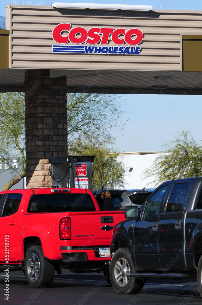 Sign and brand logo of a Costco Wholesale gas station in Mesa, Arizona