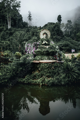 View of the statue at the entrance of the sky pagoda temple Nakhon Sri Thammaratin Surat Thani province Thailand photo