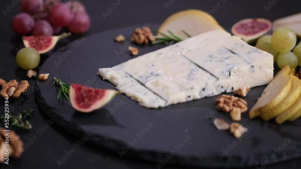 Traditional Italian Gorgonzola cheese on stone seving board