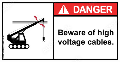 Beware of cranes hooking up high voltage cables.sign danger