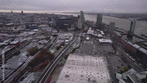 Wide aerial shot of Liverpool with industrial area and Mersey river seen after snowfall, Dec 2022 photo