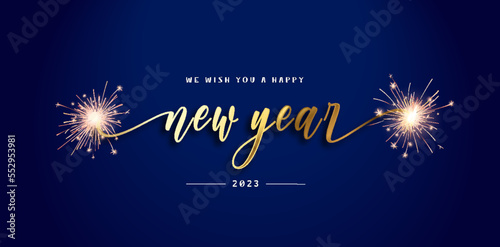 We wish you a Happy New Year 2023 unique modern ribbon calligraphic gold text with sparkler firework gold black blue color background