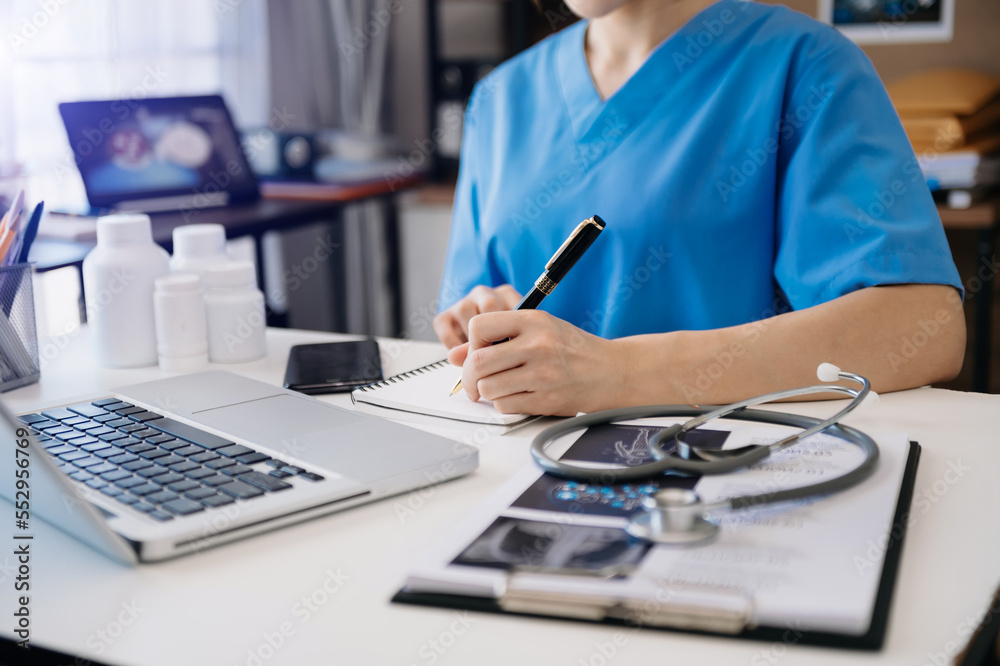 Medical technology concept. Doctor working with mobile phone and stethoscope in office. Medical technology concept. Doctor working with mobile phone and stethoscope in office.