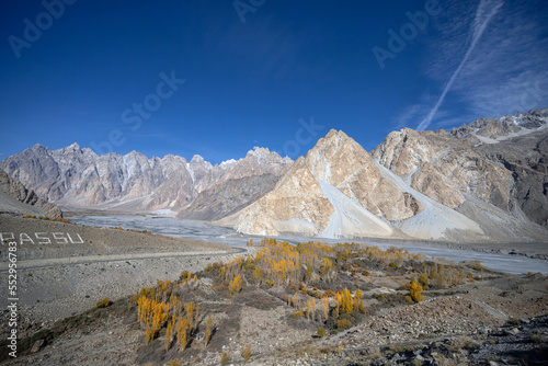 Autumn view of Passu Cones in the Gilgit Baltistan region of northern Pakistan. One of the most spectacular views on the Karakorum Highway is the Passu cones also known as Tupopdan and Passu Cathedral photo