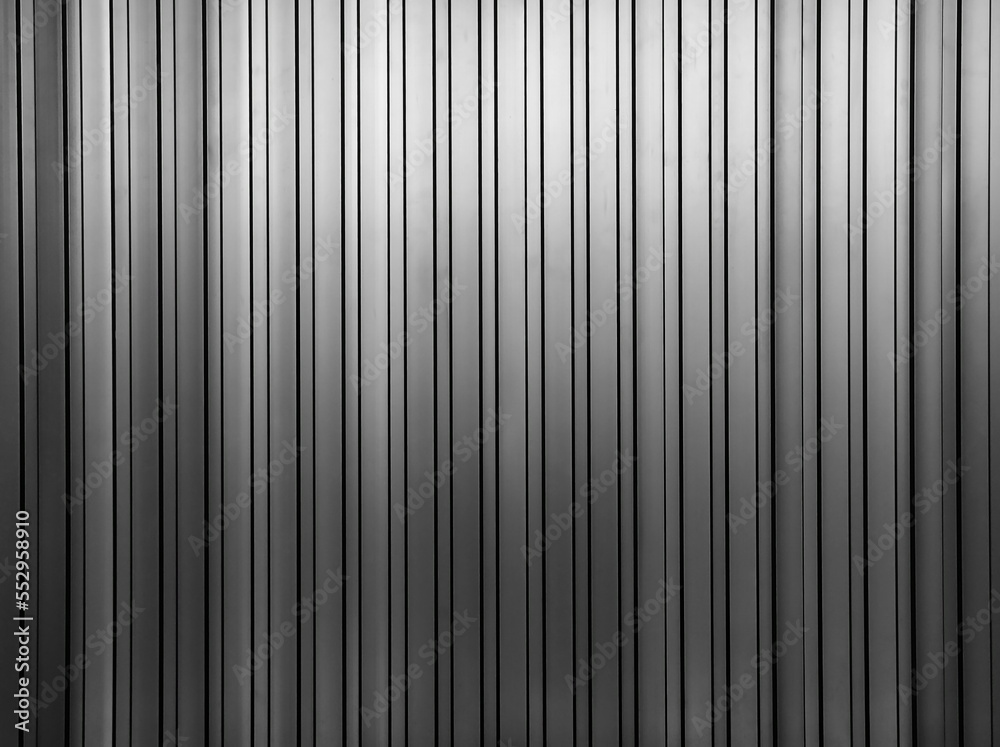 Black aluminum wall in shadow Black aluminum wall in shadow