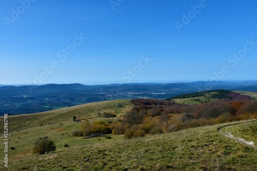 View from Vremščica mountain in Primorska, Slovenia with Divača town between the hills © kato08