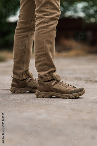 Tactical beige sneakers. Trekking shoes with a rough sole