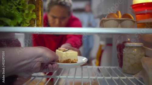Wallpaper Mural Young African-American woman try to take cake from fridge. Female on diet want to eat pasrty. Realtime Torontodigital.ca