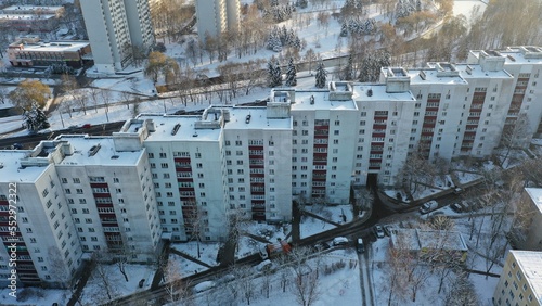 Soviet architecture of residential multi-storey buildings. Residential building in the form of an accordion. Step building. Architecture of Eastern Europe in winter. Eastern Europe in winter. © Aerial Drone Master