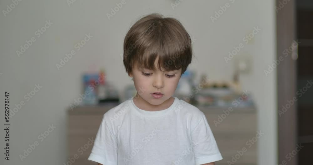 Portrait Little Child Boy Looking at Camera. Young Sad Thinking Curiosity Child Looking at Camera Closeup Indoors. Face Eyes Serious Contemplative Child Close Up. Thoughtful Kid Boy Eyes Thinking. Portrait Little Child Boy Looking at Camera. Young Sad Thinking Curiosity Child Looking at Camera Closeup Indoors. Face Eyes Serious Contemplative Child Close Up. Thoughtful Kid Boy Eyes Thinking.