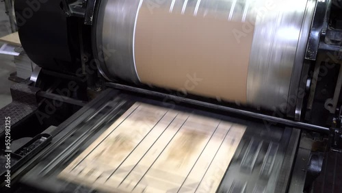 Working printing equipment in a typography workshop photo