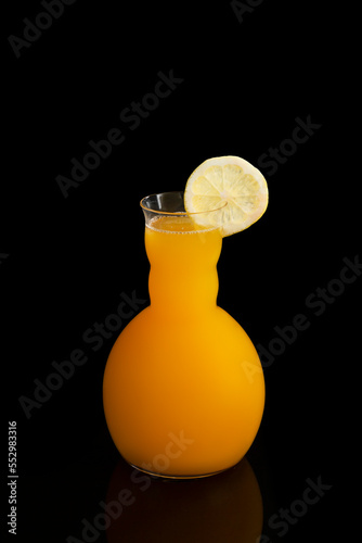 Glass of Orange Juice with Lemon photo