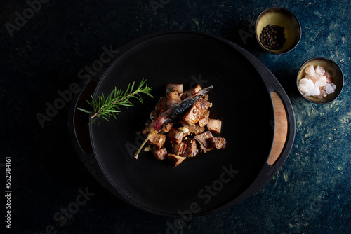 Traditional spicy liver in black pan, Arnavut Ciğeri photo