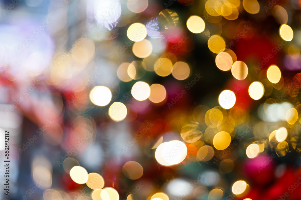 Close up of balls on christmas tree. Bokeh garlands in the background. New Year concept. Close up of balls on christmas tree. Bokeh garlands in the background. New Year concept.