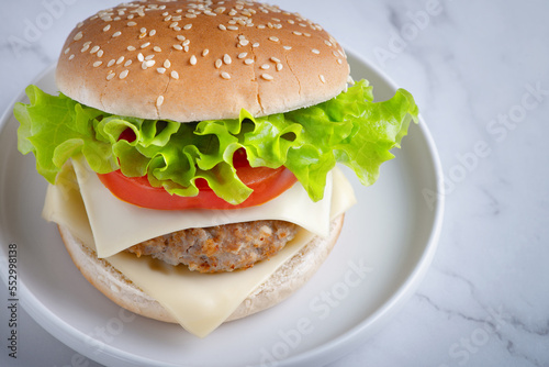 Fresh tasty burger on white background