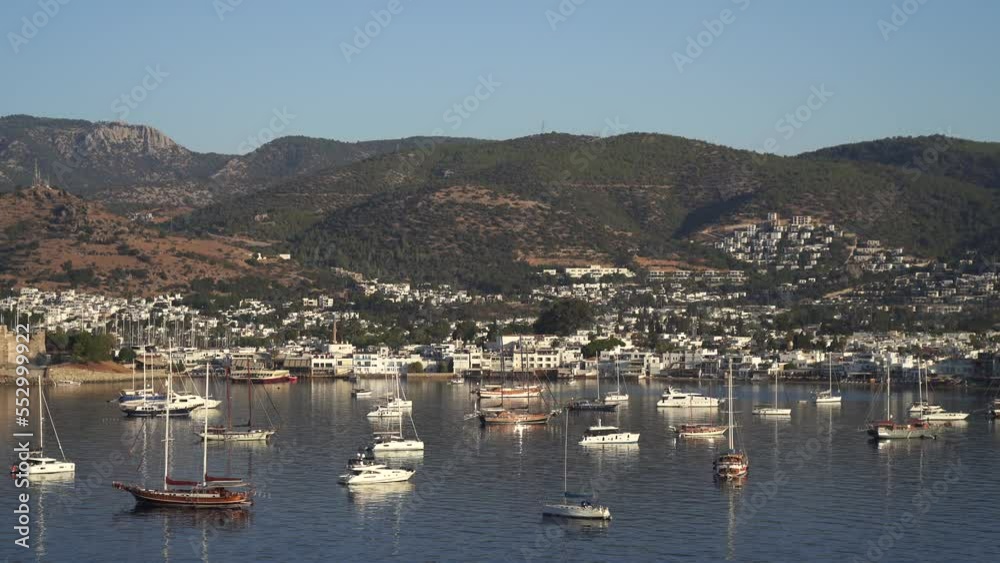 Aerial view of Bodrum bay, Turkey. Seashore, sailboats, boats, mountains and fort in Bodrum. Aerial view of Bodrum bay, Turkey. Seashore, sailboats, boats, mountains and fort in Bodrum.