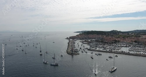 Aerial view, yachts leave the bay to the starting point of the regatta rolex cup 2019