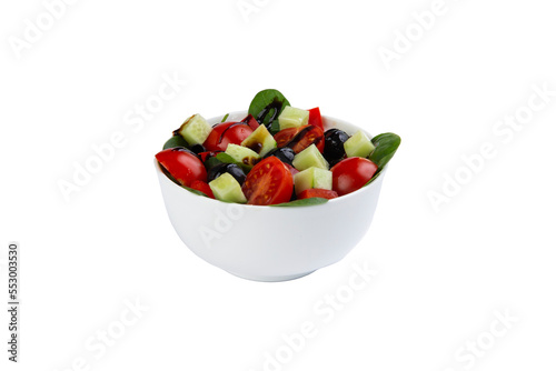 Salad with tomatoes, cucumbers and olives in a plate. Selective focus. transparent.