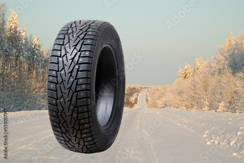 winter tires with a good tire profile on the wintry landscape with snow-covered roads