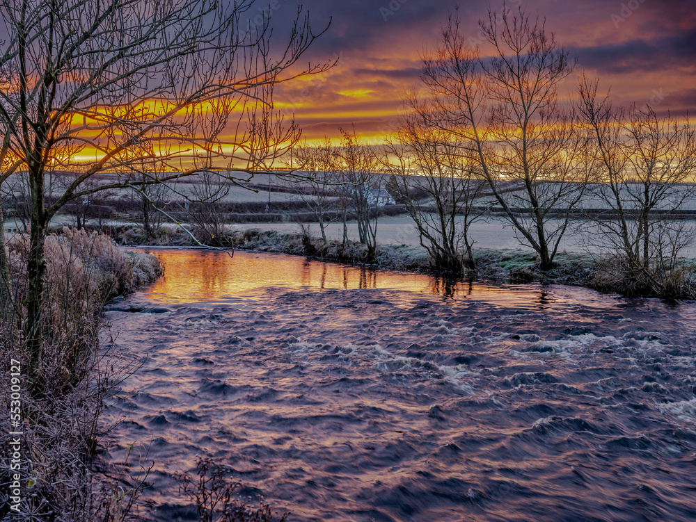 Winter sunrise reflected in the River Winter sunrise reflected in the River