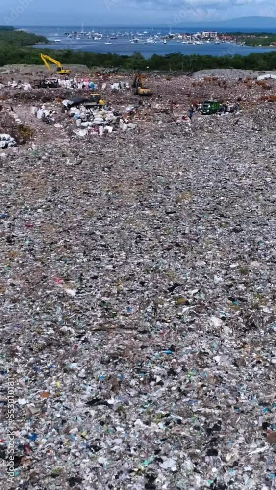 Aerial shot of a huge trash dump site between Kuta and Sanur, Bali Aerial shot of a huge trash dump site between Kuta and Sanur, Bali