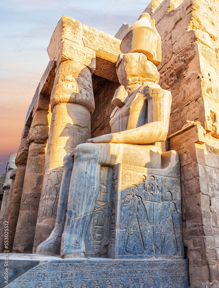 Seated Rameses II Statue at the entrance of Luxor Temple, Egypt