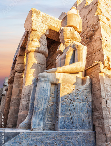 Seated Rameses II Statue at the entrance of Luxor Temple, Egypt
