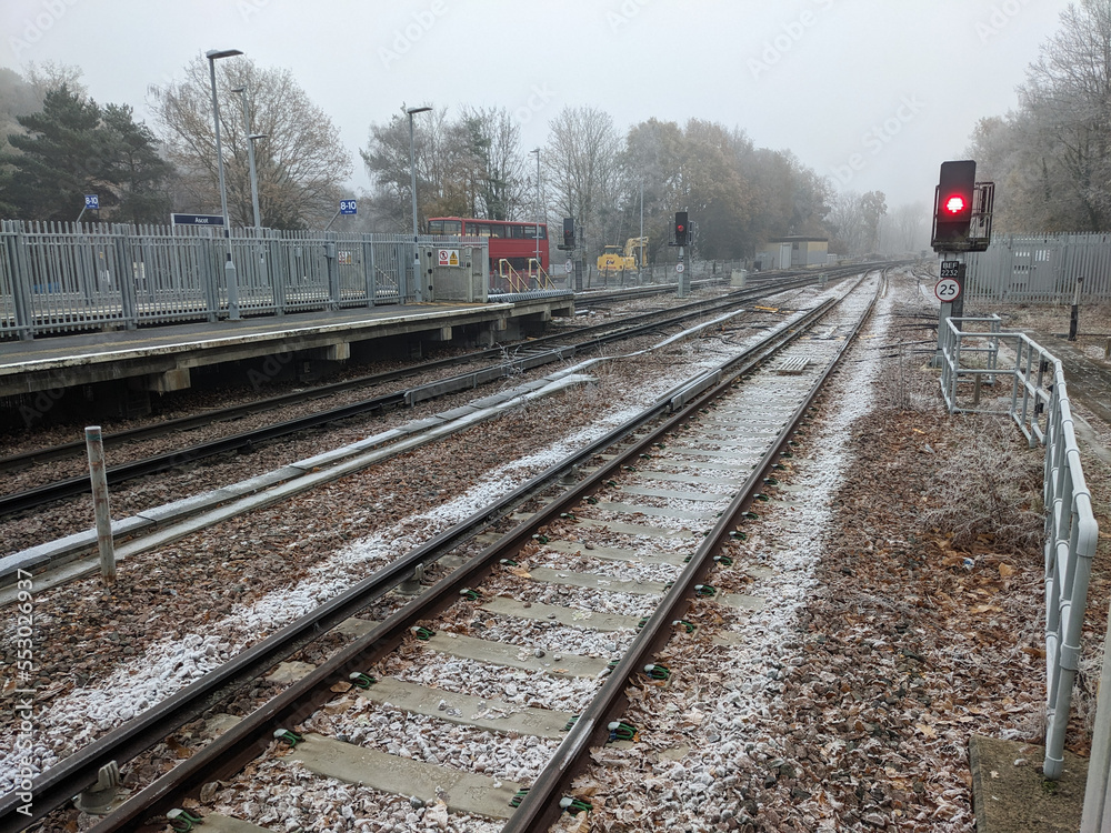 Fototapeta premium A Railway Train Station Line Tracks on a Frosty Morning Transport