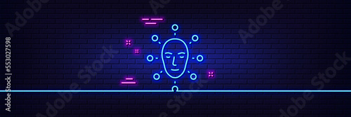 Neon light glow effect. Face biometrics line icon. Facial recognition sign. Head scanning symbol. 3d line neon glow icon. Brick wall banner. Face biometrics outline. Vector © blankstock