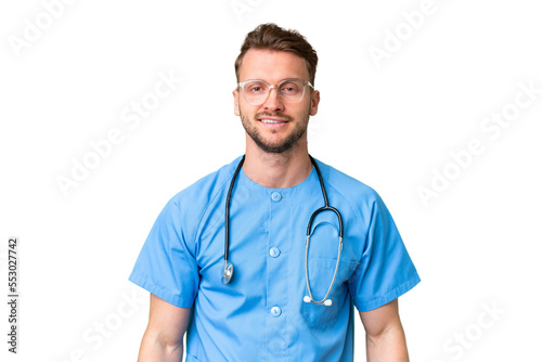 Young nurse man over isolated chroma key background with glasses and happy