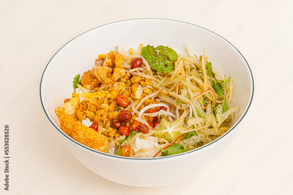 Com hen, Vietnamese rice dish with baby basket clams rice, Vietnamese food isolated on white background; close-up Com hen, Vietnamese rice dish with baby basket clams rice, Vietnamese food isolated on white background; close-up