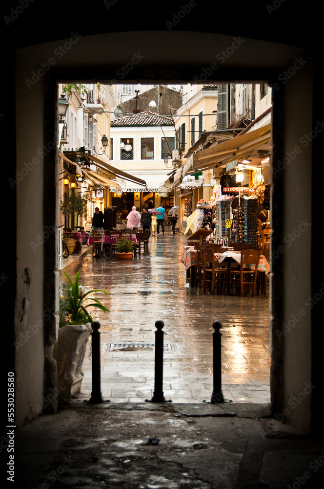Greek village with rain in frame