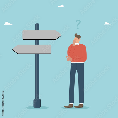 Look for the right direction, business opportunity or path to success, make a decision or make a career, a confused man does not know which path to take, a man at a crossroads.