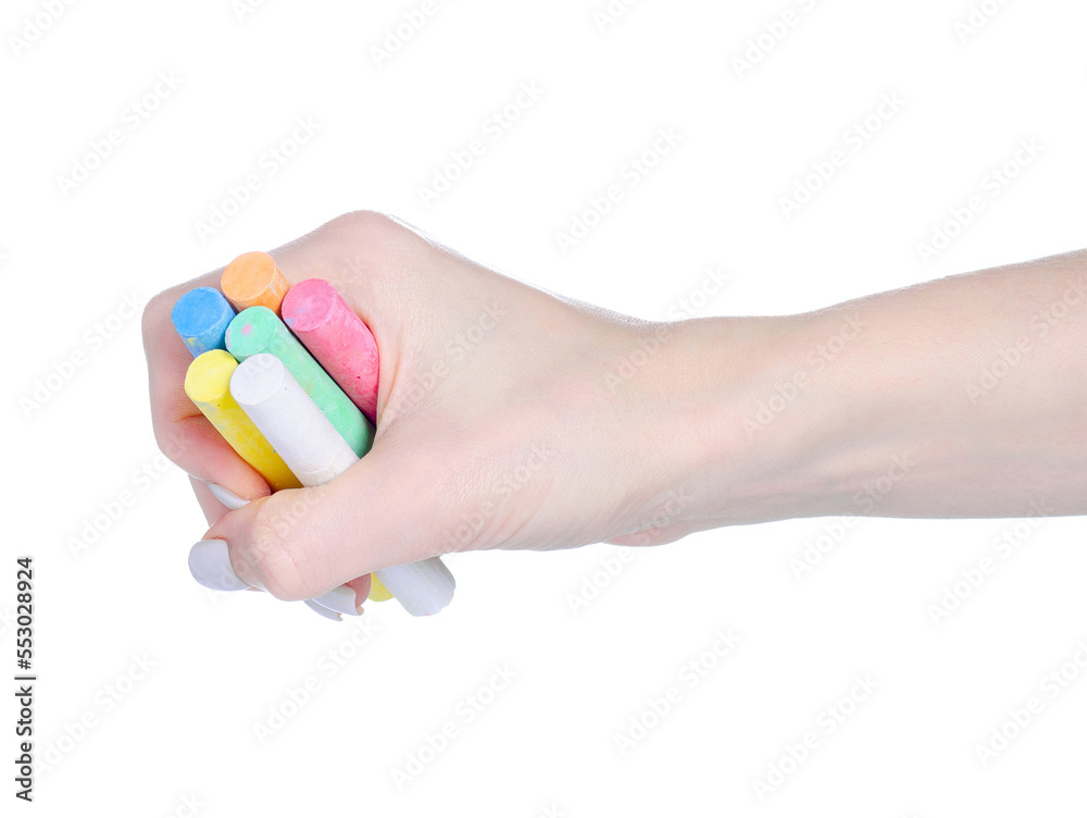 Multicolored crayons drawing in hand on white background isolation Multicolored crayons drawing in hand on white background isolation
