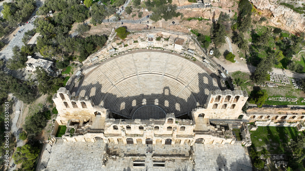 Aerial drone photo from iconic ancient theatre of Herodes Atticus near Acropolis hill, Athens historic center, Attica, Greece                              