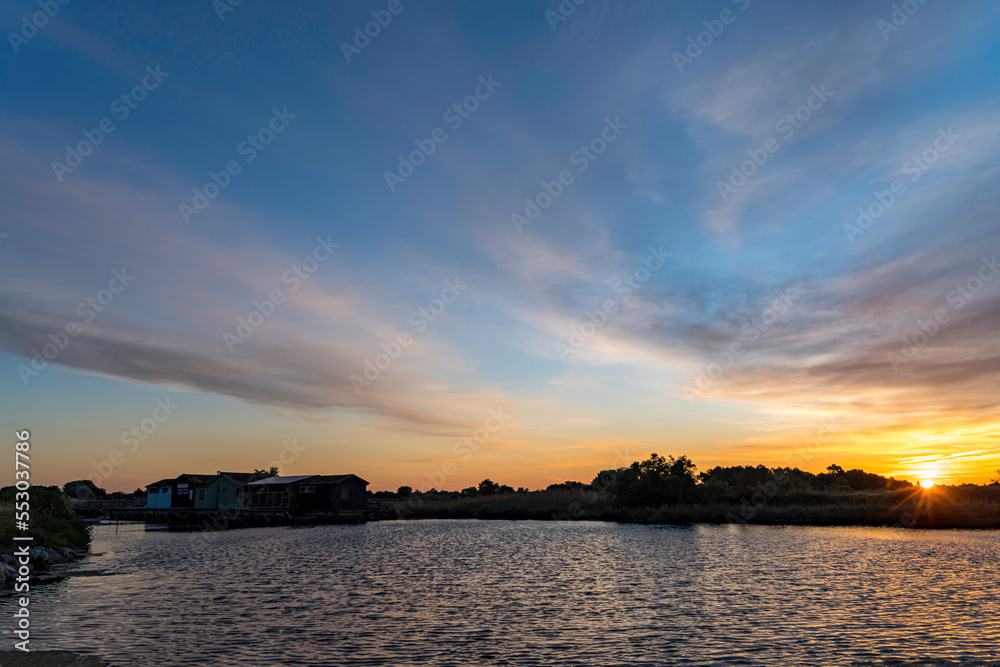 Sunrise of Port des Salines with sunlight and water reflection, Ile Oleron, May 2022