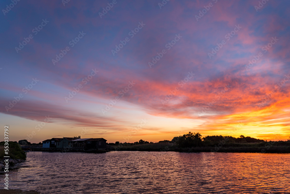 Sunrise of Port des Salines with full colored sky and water reflection, Ile Oleron, May 2022
