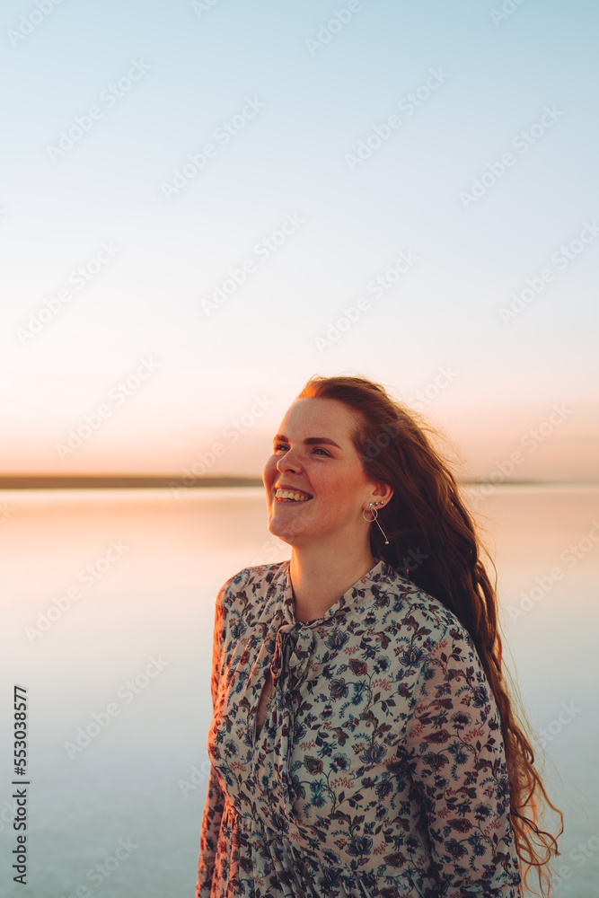 Portrait happy laughing woman in pink dress Portrait happy laughing woman in pink dress