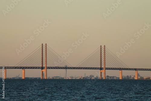 The   resund Bridge is a cable-stayed road and rail bridge with a length of 7845 m  running over the   resund Strait  connecting the capital of Denmark     Copenhagen with the Swedish Malm  .