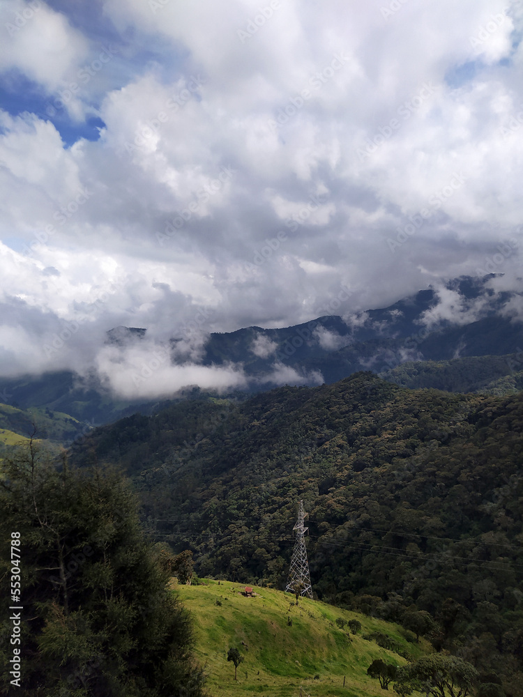 photography of mountainous landscape with clouds