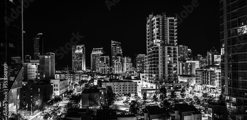 Monochromatic Cityscape of San Diego Downtown, skyline, skyscraper buildings, at night in the black sky backgrounds in Southern California, USA, high angle rooftop view
