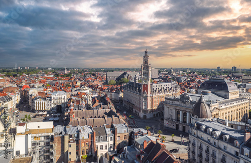 Cityscape of Lille (Hauts-de-france, Flanders, France) at sunset: Aerial skyline view of the historical Grand Place du Général-de-Gaulle, old town main square. 