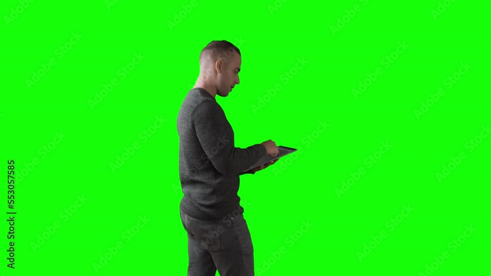 Talking System Administrator Man With A tablet Standing. IT Technician concept. ProRes 422HQ 12 Bit mov.