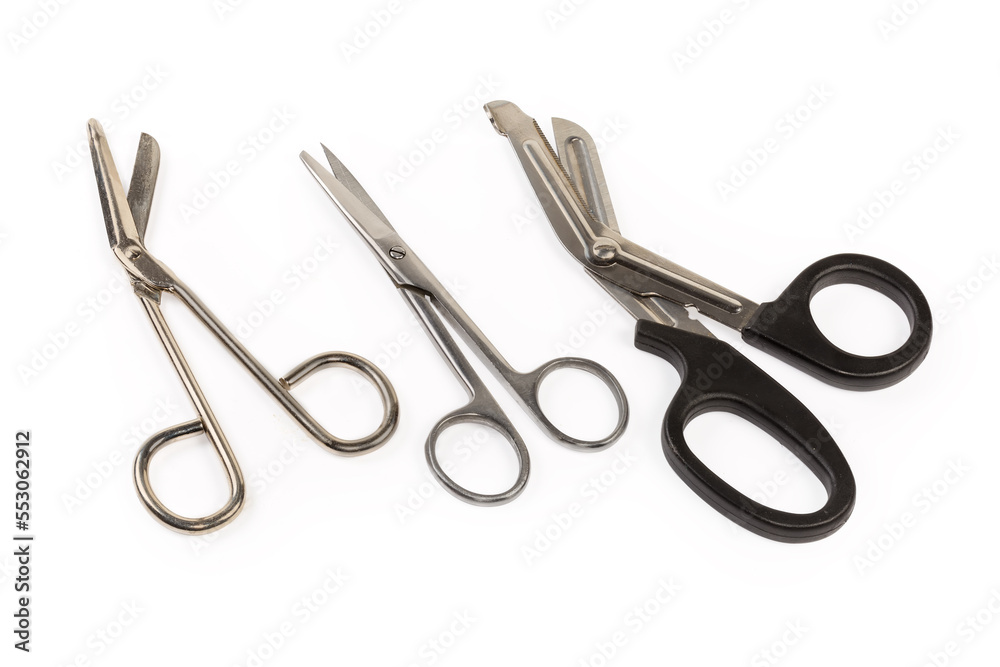 Different stainless steel scissors for medical purposes on white background Different stainless steel scissors for medical purposes on white background