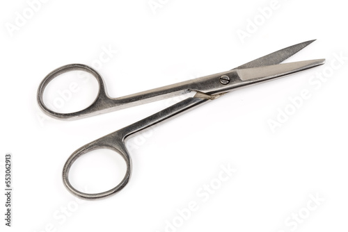 Stainless steel surgical scissors on a white background