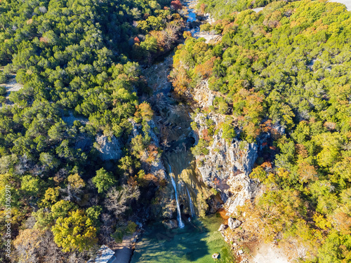 Sunny view of the fall color of Turner Falls