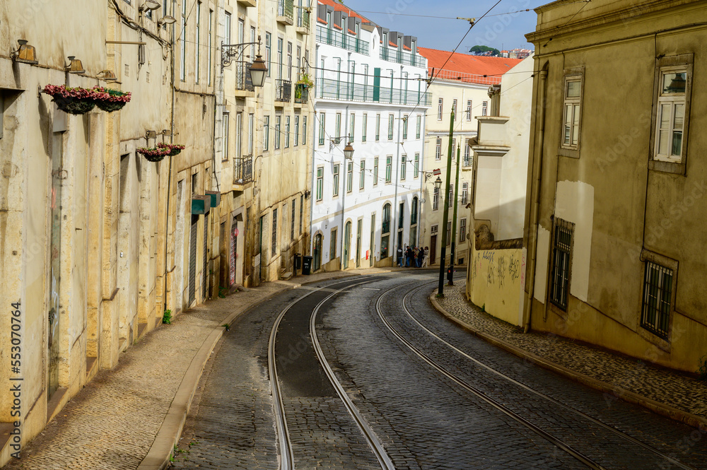 Lisbon, Portugal, November 6, 2022. Public transportation in Lisbon, touristic route Alfama old city with cable tram line 28, famous touristic attraction