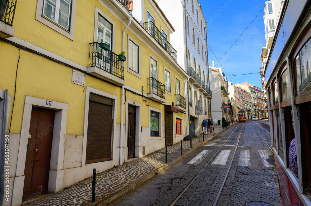 Lisbon, Portugal, November 6, 2022. Public transportation in Lisbon, touristic route Alfama old city with cable tram line 28, famous touristic attraction