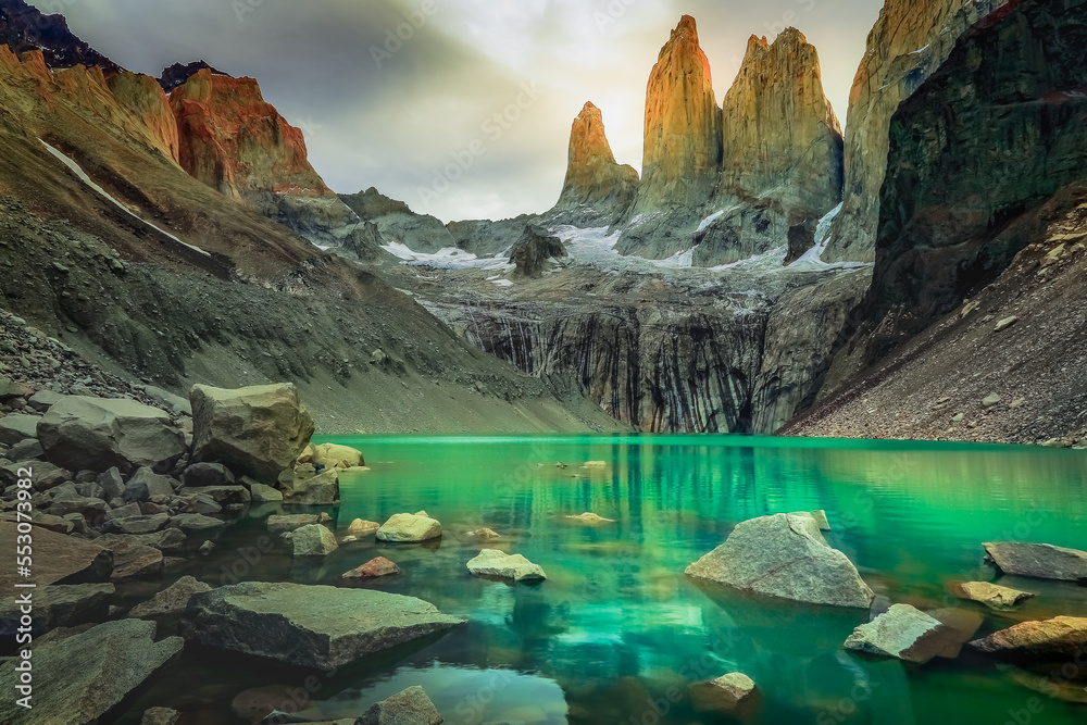 Torres Del Paine granites at sunrise and lake reflection, Chilean Patagonia